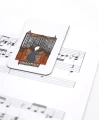 Muzyczna zakładka magnetyczna - organista i muzyczny cytat