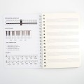 Notes na spirali w pięciolinię format A6 motyw Huśtawki 50 stron miękka okładka