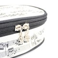 Piórnik materiałowy owalny kremowy w nuty 21x10x6cm kosmetyczka