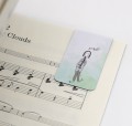 Muzyczna zakładka magnetyczna - klarnecista i muzyczny cytat